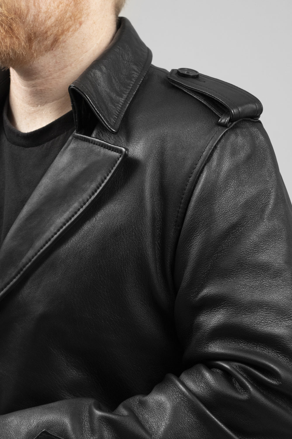 Whet Blu NYC Parker men's leather overcoat, left-side close view of fashion leather jacket