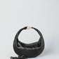 The Piccola Ring Bag