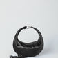 The Piccola Ring Bag