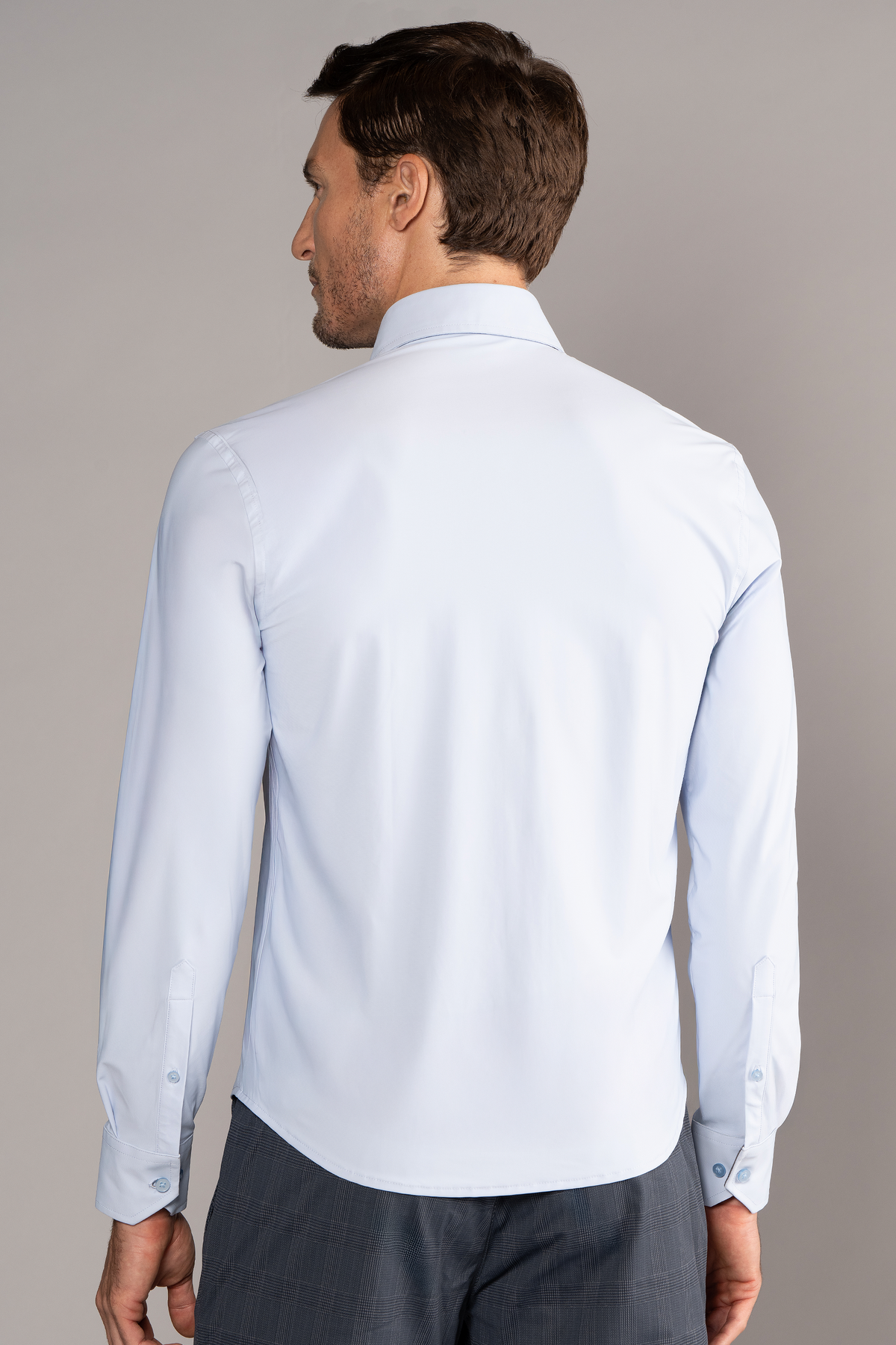 Powder blue Twillory event shirt with solid fabric, collar, and button-down design, perfect for formal or casual occasions.