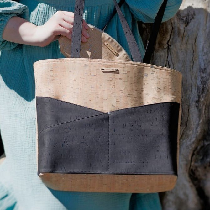 Carry Courage ADVOCATE zippered tote in coal black with sturdy handles and secure zipper closure