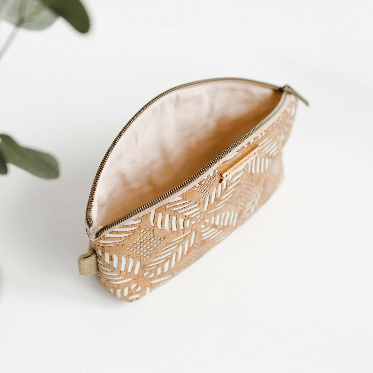 Carry Courage RULE BREAKER cream zippered pouch with bold printed text and compact rectangular design