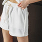 Flying Tomato Call My Lovely shorts in white, casual denim shorts with distressed detailing and frayed hem.