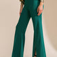 Flying Tomato Hey Darling woven flare pants in green, featuring a high waist and flared leg design.