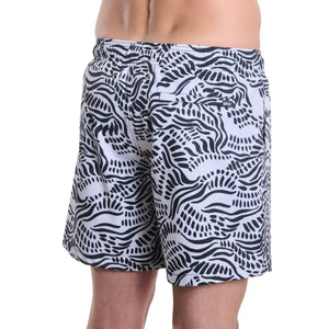 Capelle Miami Salt Spray Surf and Storm hybrid swim trunks with bold print and compression lining, suitable for beach and resort wear.
