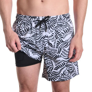 Capelle Miami salt spray surf and storm hybrid swim trunks with colorful print and compression lining, designed for beach and resort wear.