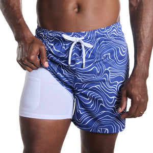 Capelle Miami hybrid swim trunks with sand wave and harbor print, featuring compression lining for swim and resort activities.