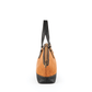 Deux Mains East-West Handbag satchel in side view, showcasing its structured silhouette and spring collection design