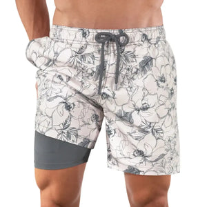 Capelle Miami Secret Garden hybrid swim trunks with vibrant floral print, featuring compression lining for comfort and support.