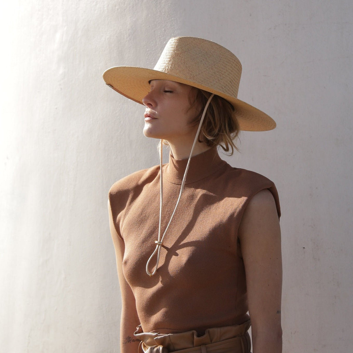 KIN THE LABEL Panama straw sun hat from the Neva collection, woven design with a classic brim