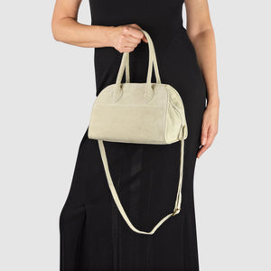 Beige Italian genuine suede top-handle bag by TAKEASY with sleek leather accents, featuring a classic and elegant design.