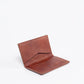 Deux Mains woven card holder in tan, interior view with card slots