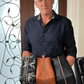 Deux Mains Iron Tight toiletry bag in assorted colors, showing multiple compact accessory bags.