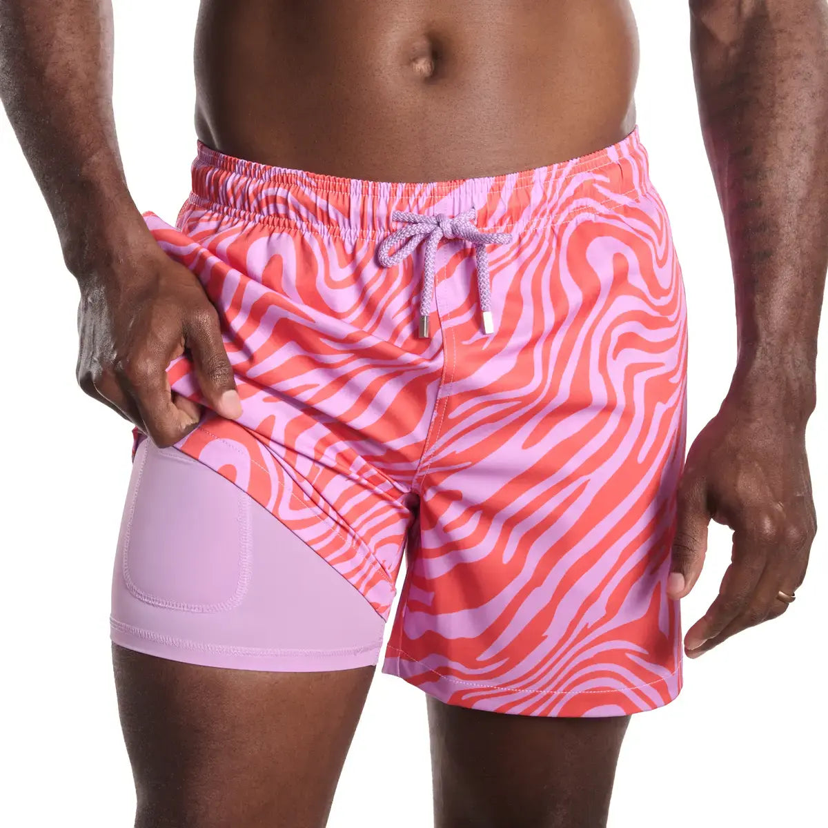 Capelle Miami tropical swirl coral and orchid hybrid swim trunks with compression lining, featuring vibrant print design.