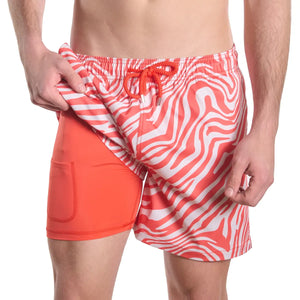 Capelle Miami Tropical Swirl hybrid swim trunks in coral and sand with vibrant tropical print and compression lining.