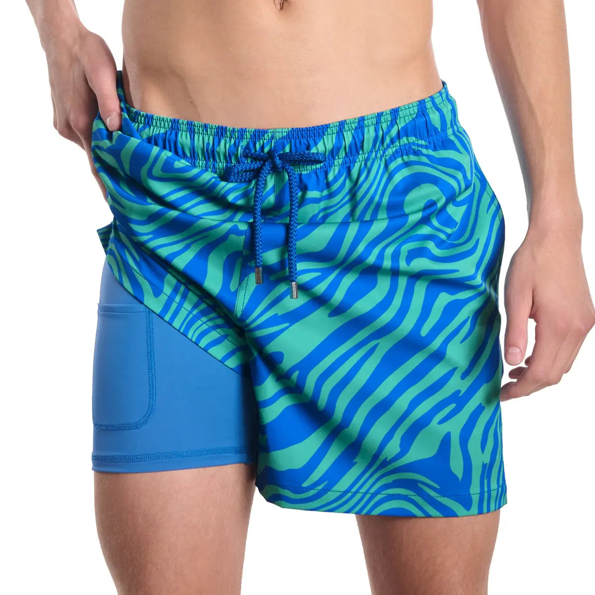 Capelle Miami hybrid swim trunk with tropical swirl, ocean, and palm print, featuring compression lining for swim and resort wear.