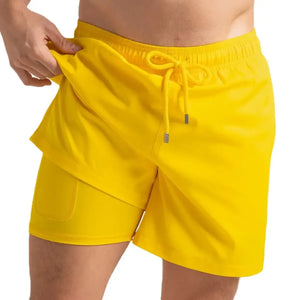 Capelle Miami True Yellow hybrid swim trunks with compression lining, solid yellow design, suitable for swimming and resort wear.