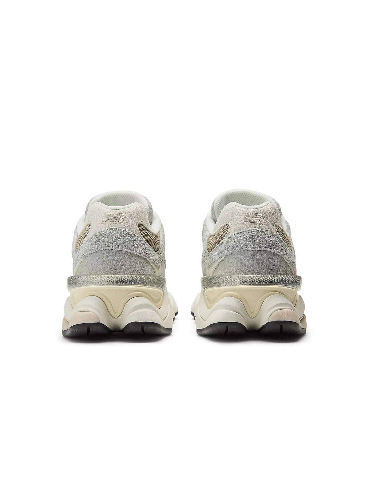 Men's New Balance 9060 lifestyle shoes in grey with sporty design, featuring breathable mesh and supportive sole.