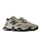 Beige New Balance 9060 men's lifestyle shoes with cushioned soles and stylish design, displayed on a clean background.