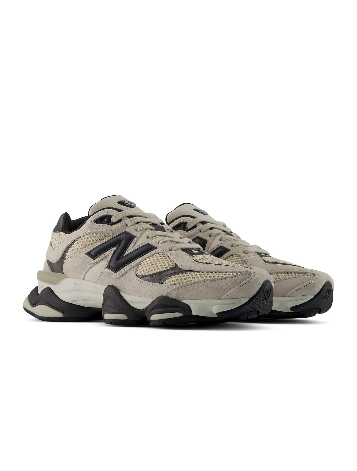 Beige New Balance 9060 men's lifestyle shoes with cushioned soles and stylish design, displayed on a clean background.