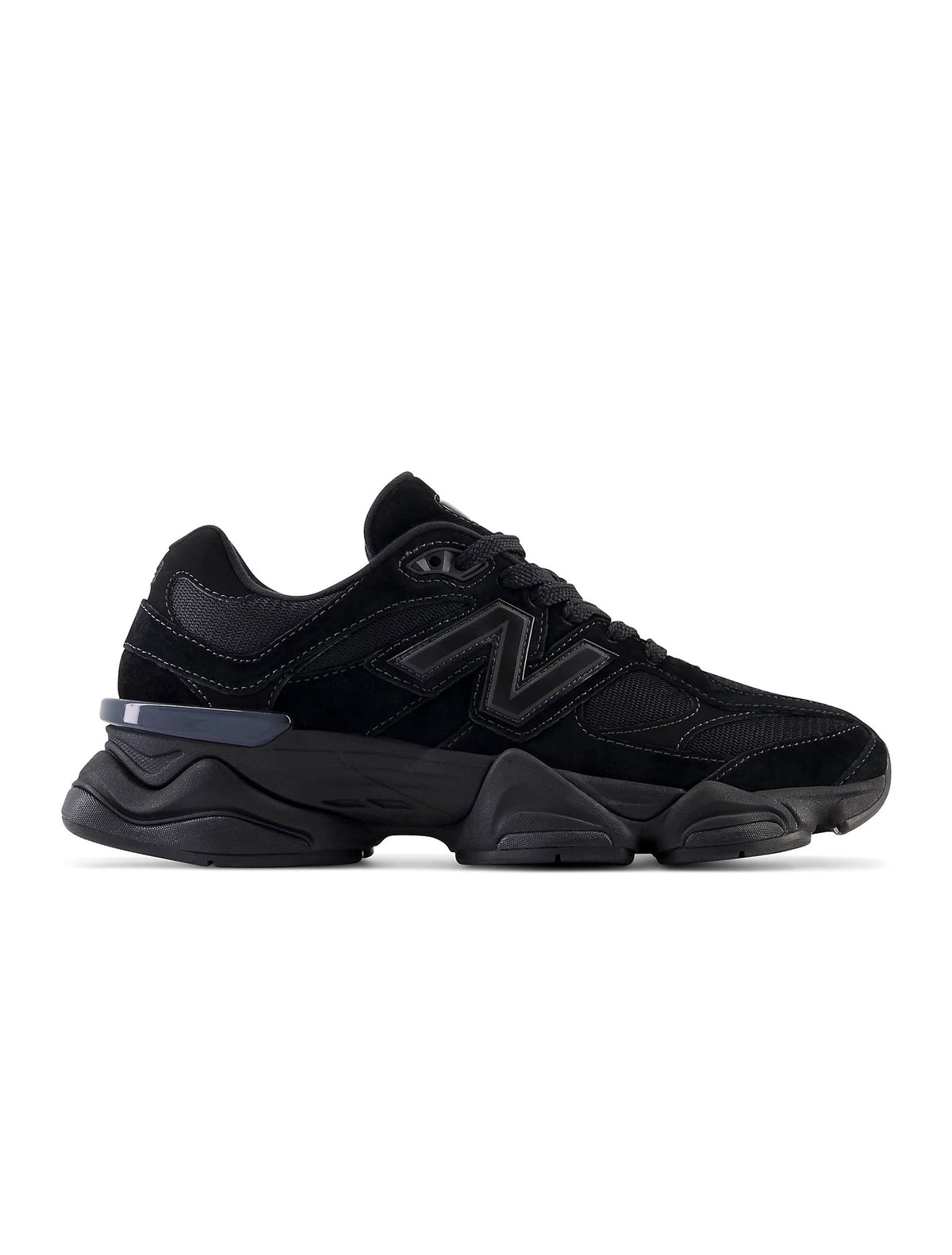 Black New Balance 9060 men's lifestyle shoes featuring stylish design and comfortable sneakers for casual wear.
