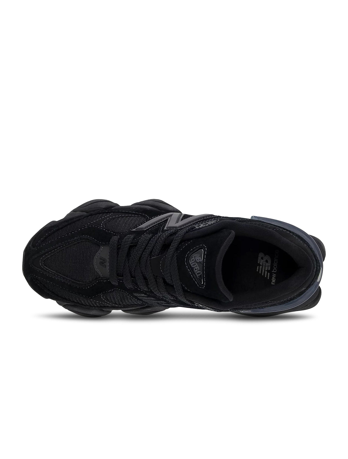 Black New Balance 9060 men's lifestyle shoes with sleek design, showcased in a close-up view highlighting the footwear style.