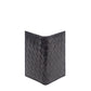 Deux Mains woven card holder in black, front view with textured woven design and card slots