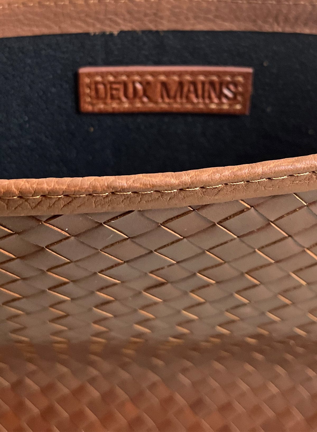 Brown woven Deux Mains laptop sleeve detail view