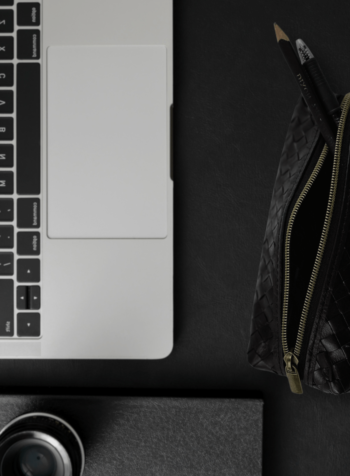 Black woven Deux Mains pencil case flat lay for corporate goods