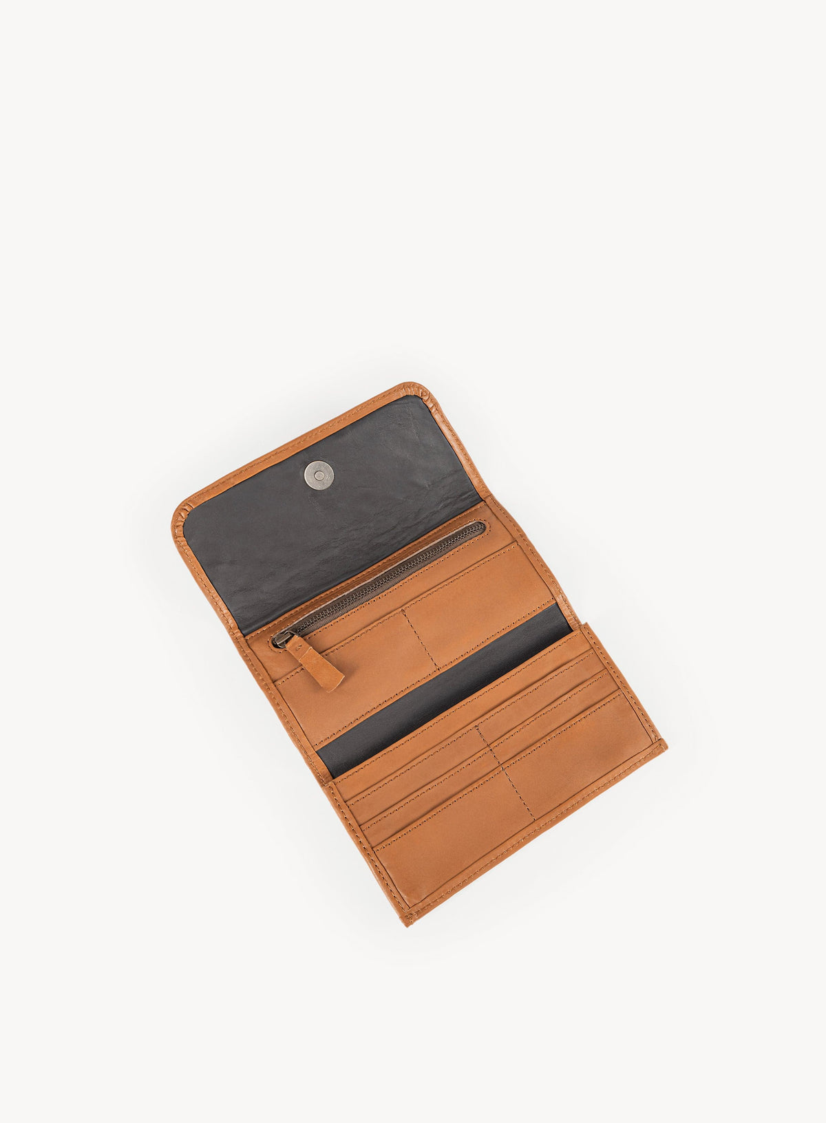 Deux Mains woven wristlet wallet with textured woven design and wrist strap