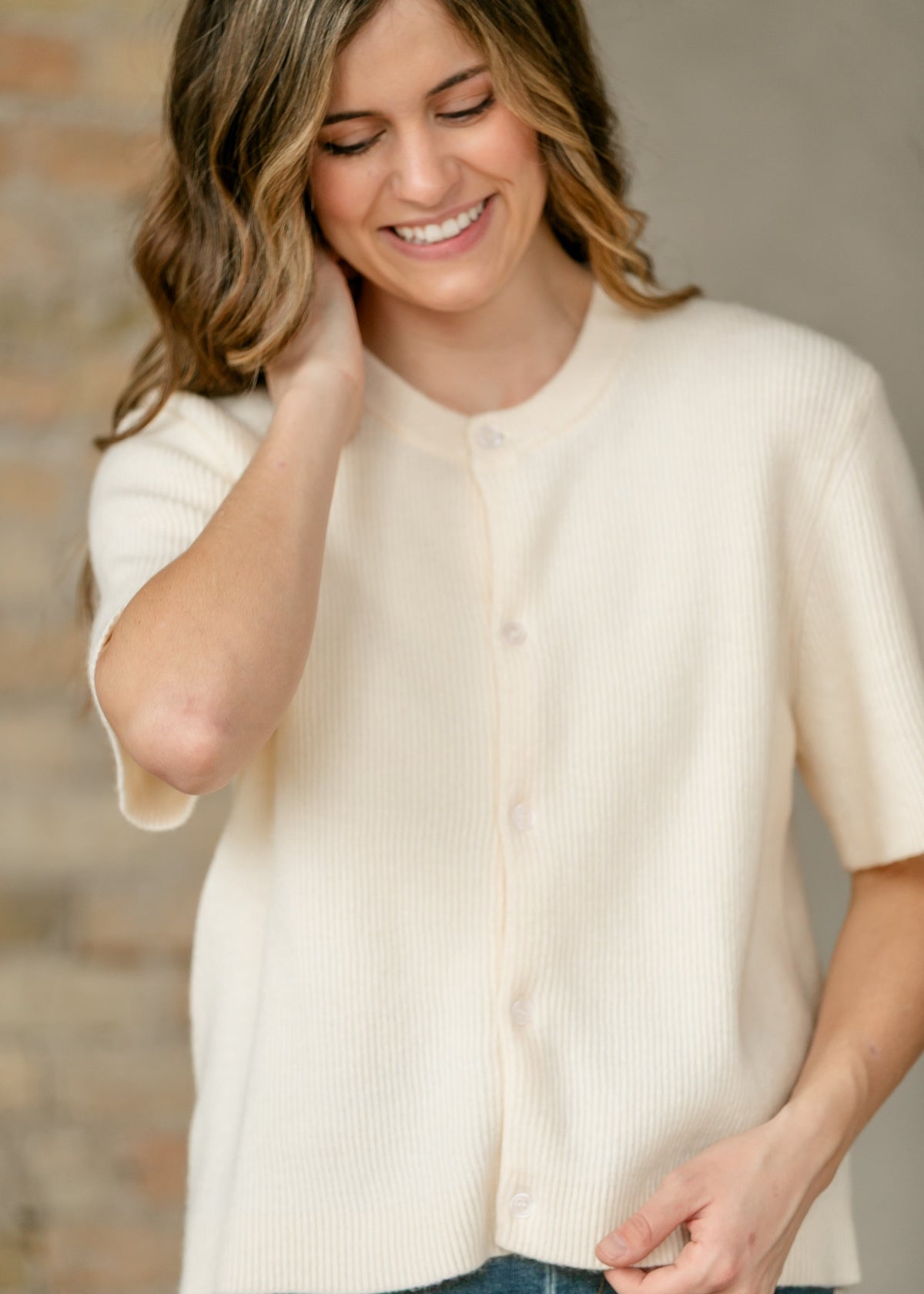 Inherit Co. Zadie ivory short sleeve button-front cardigan layered over a tee