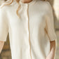 Inherit Co. Zadie ivory short sleeve button-front cardigan from IC Layering Essentials collection